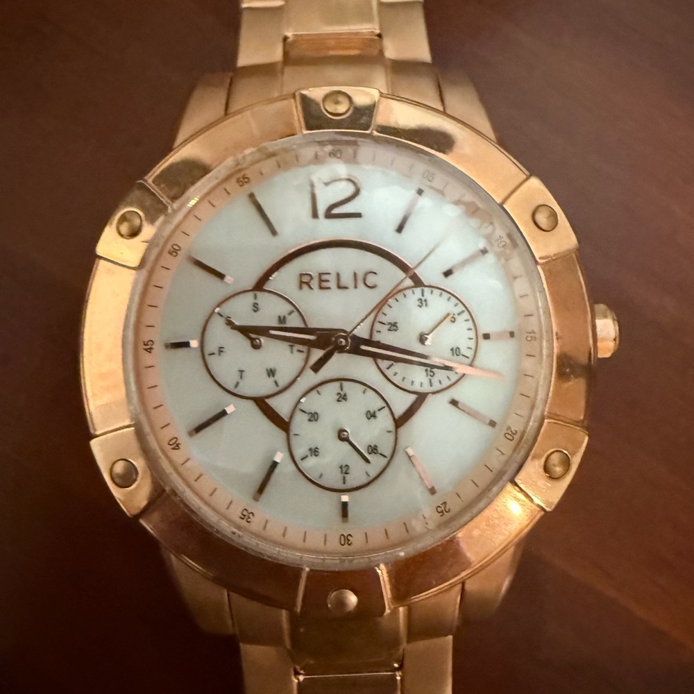 Gold Relic Watch with White Face